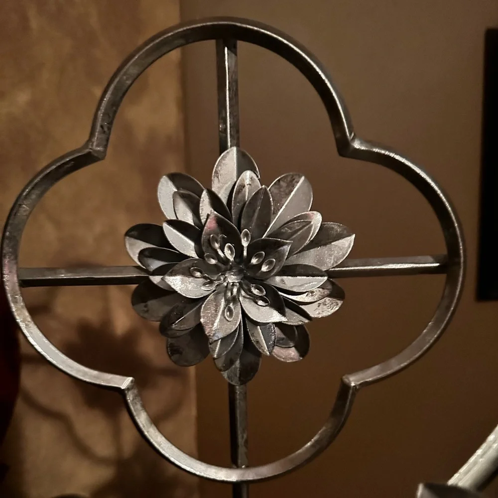 Home decor accents  two silver flowers on pedestal stand